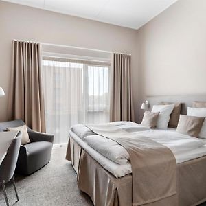 Habitación Confort con Cama Queen